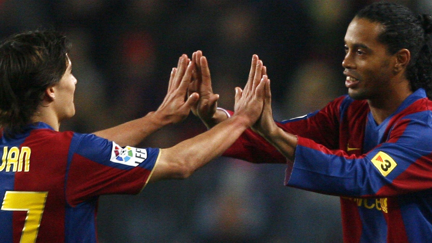 FC Barcelona's Bojan (L) is substituted