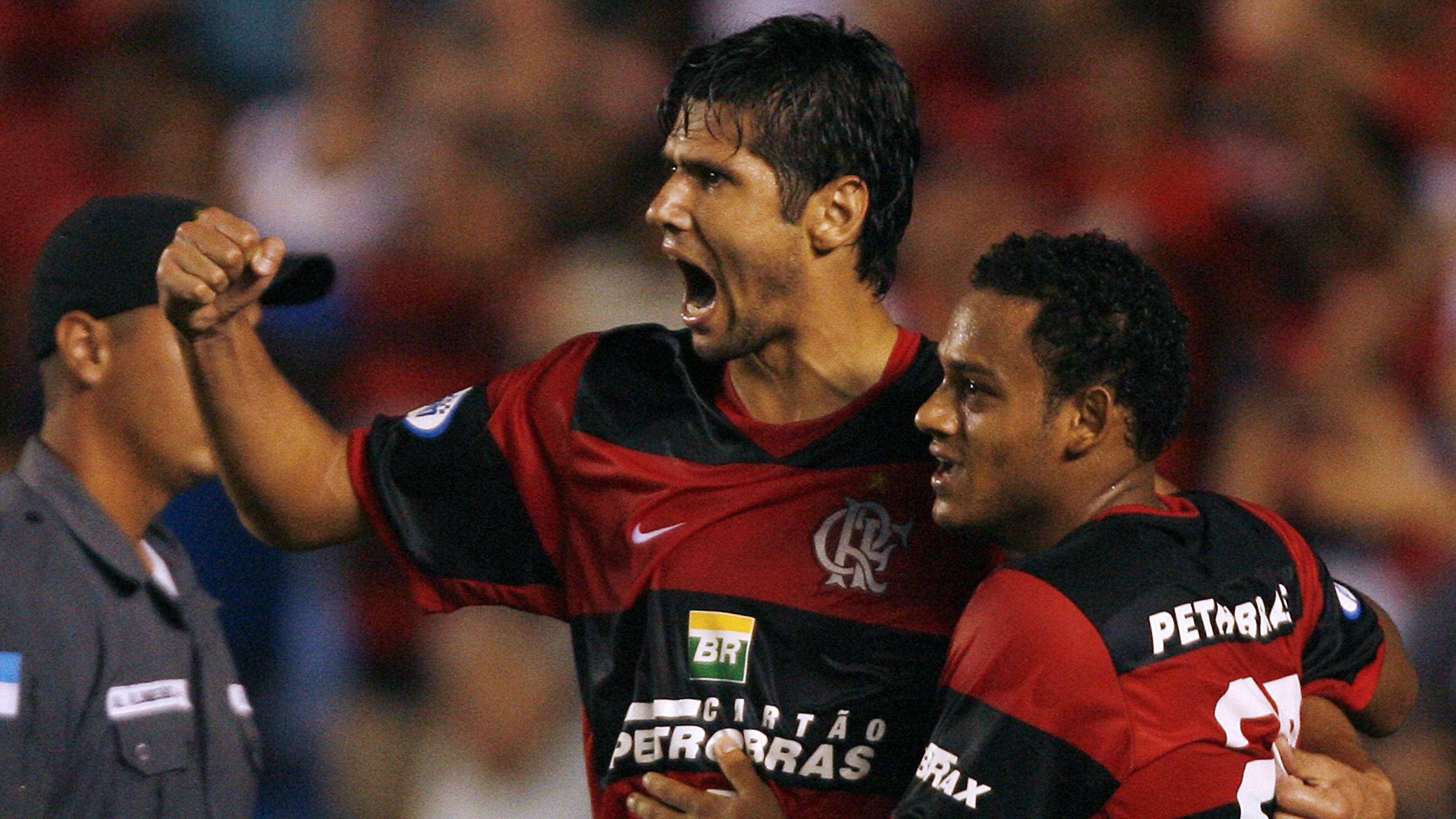 Marcinho (R) and Fabio Luciano of Flamen