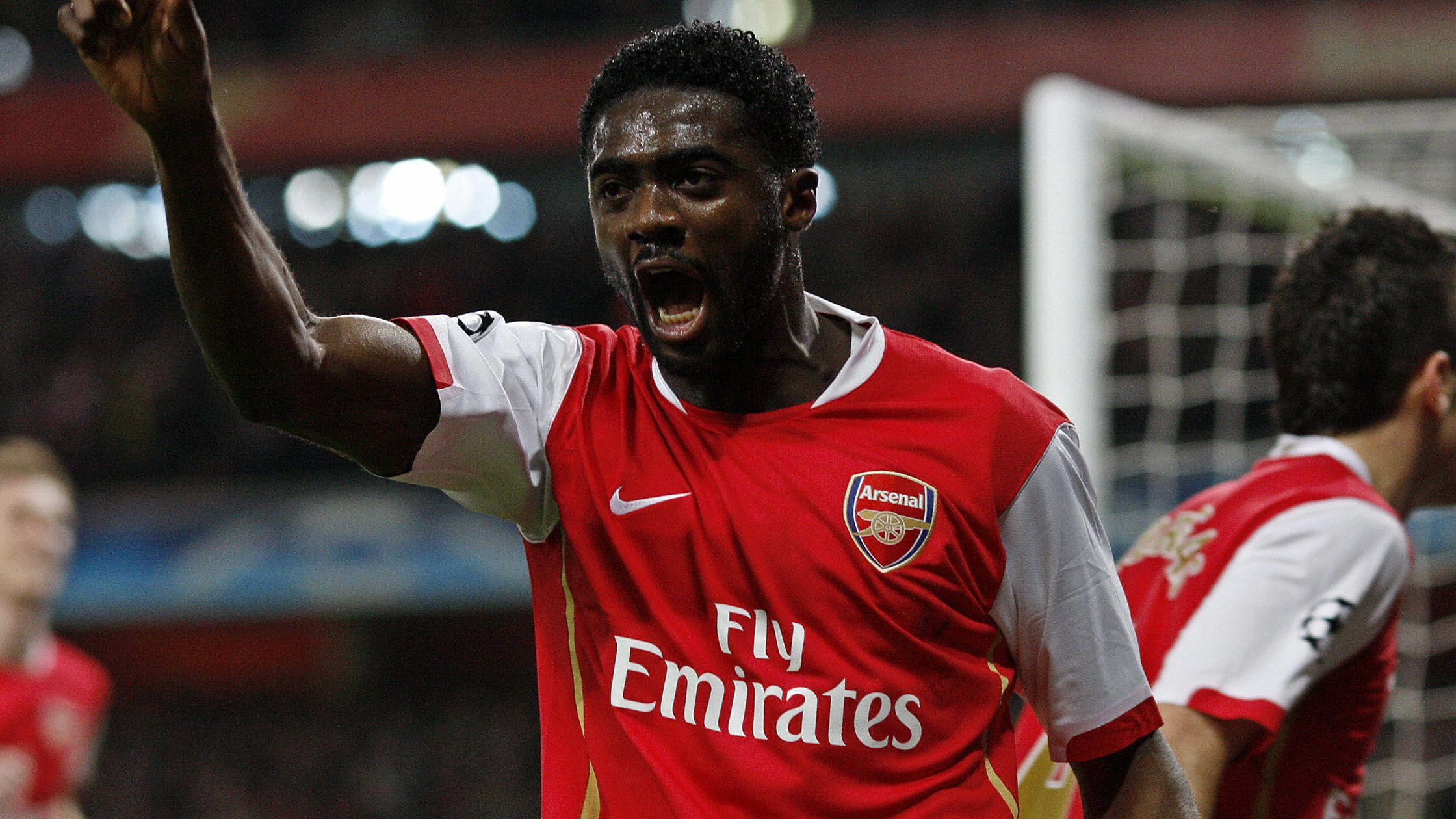 Arsenal's Kolo Toure (C) celebrates afte