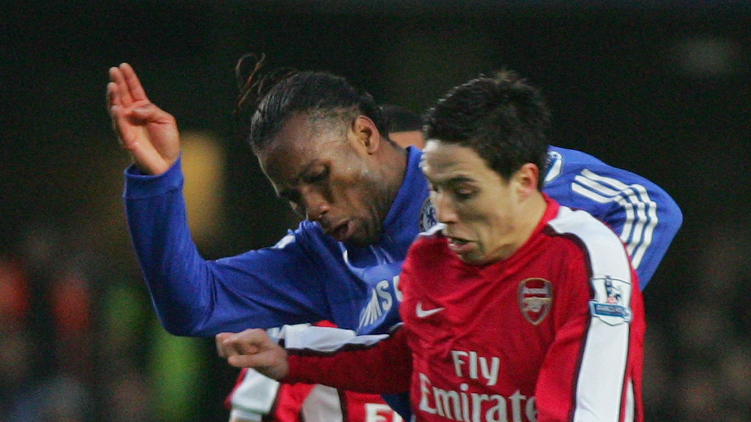 Didier Drogba (L) of Chelsea and Samir N