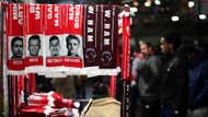  Match day scarves are seen being sold outside the stadium prior to the Premier League match between Arsenal FC and West Ham United.