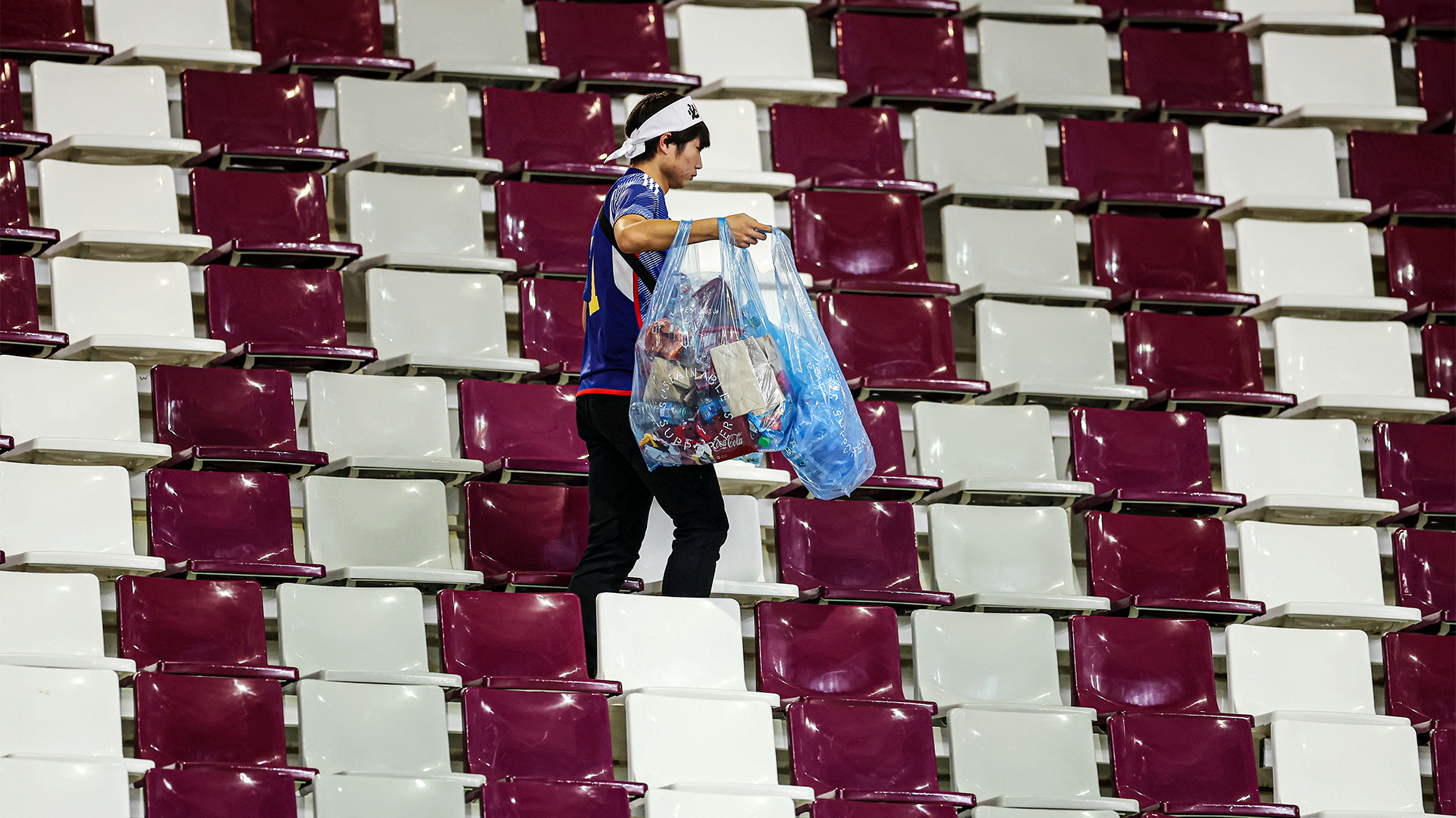 Wonderful Japan fans help Qatar workers pick up stadium trash after thrilling World Cup win vs Germany - Goal.com
