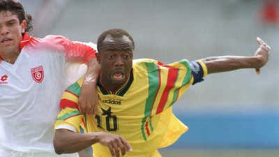 Ghana's Abedi Pele chases the ball during Ghana's 2-1 victory today at Port Elizabeth in the First round of the 1996 African Cup of Nations