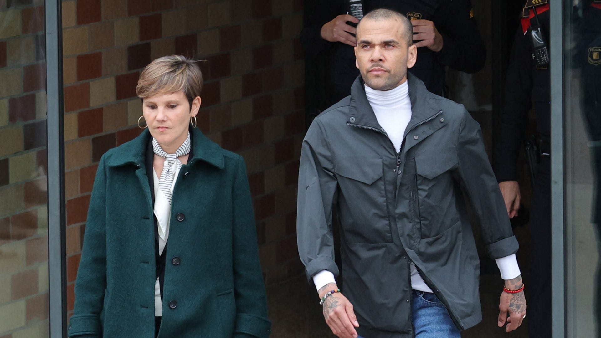 Dani Alves released from jail after finally paying €1m bail following rape conviction as ex-wife claims former Barcelona defender is 'dead' to her
