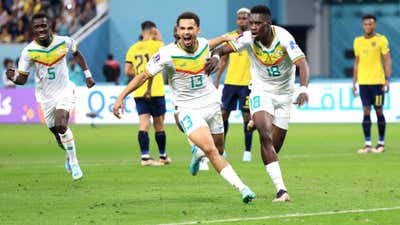 Senegal players celebrate Ismaila Sarr's goal