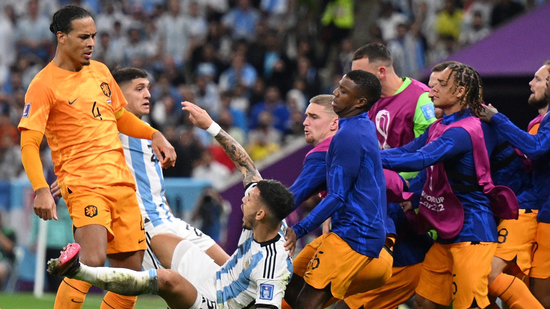 WATCH: Van Dijk FLATTENS him! Argentina star Paredes nearly starts a riot  by booting ball into Netherlands bench during World Cup quarter-final |  