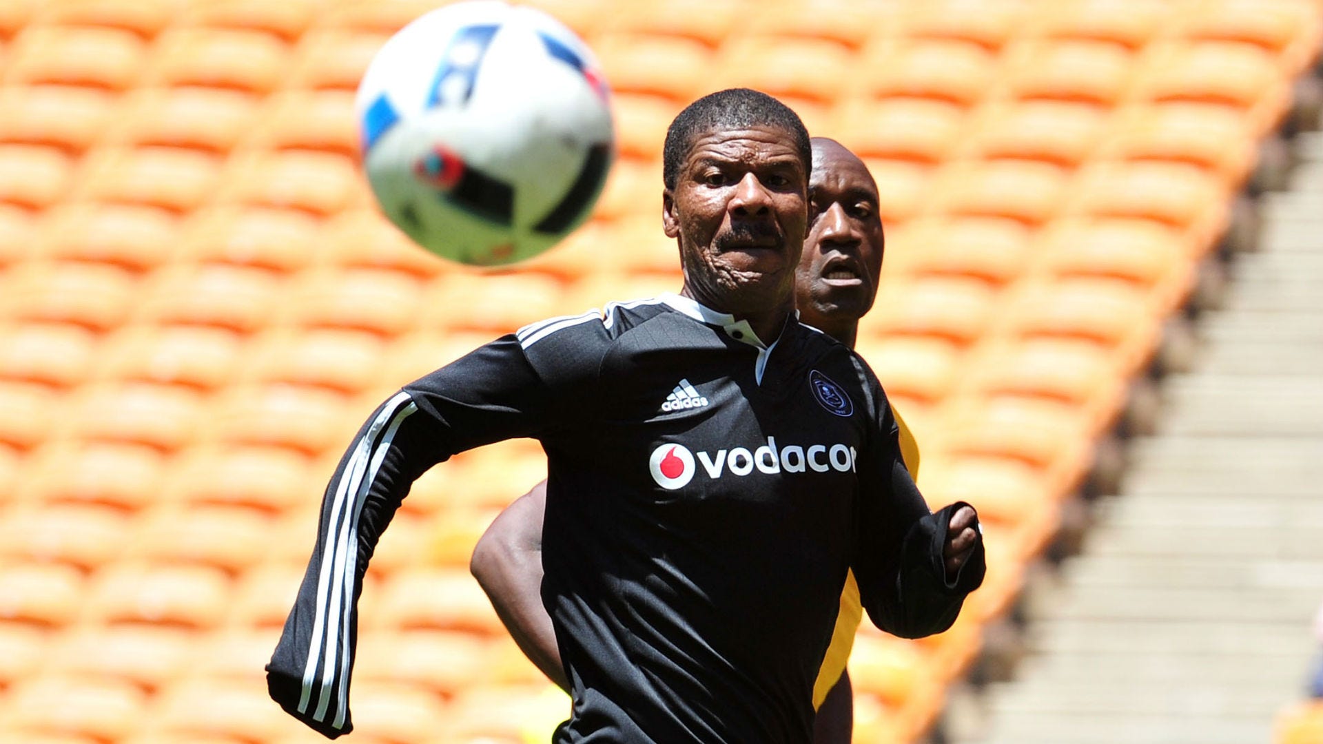Jerry Sikhosana of Orlando Pirates challenged by Patrick Mabedi of Kaizer Chiefs