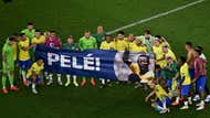 Brazil team pose w Pele banner 16:9