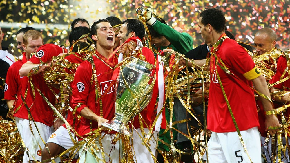  Manchester United players celebrate winning the 2007-08 Champions League.