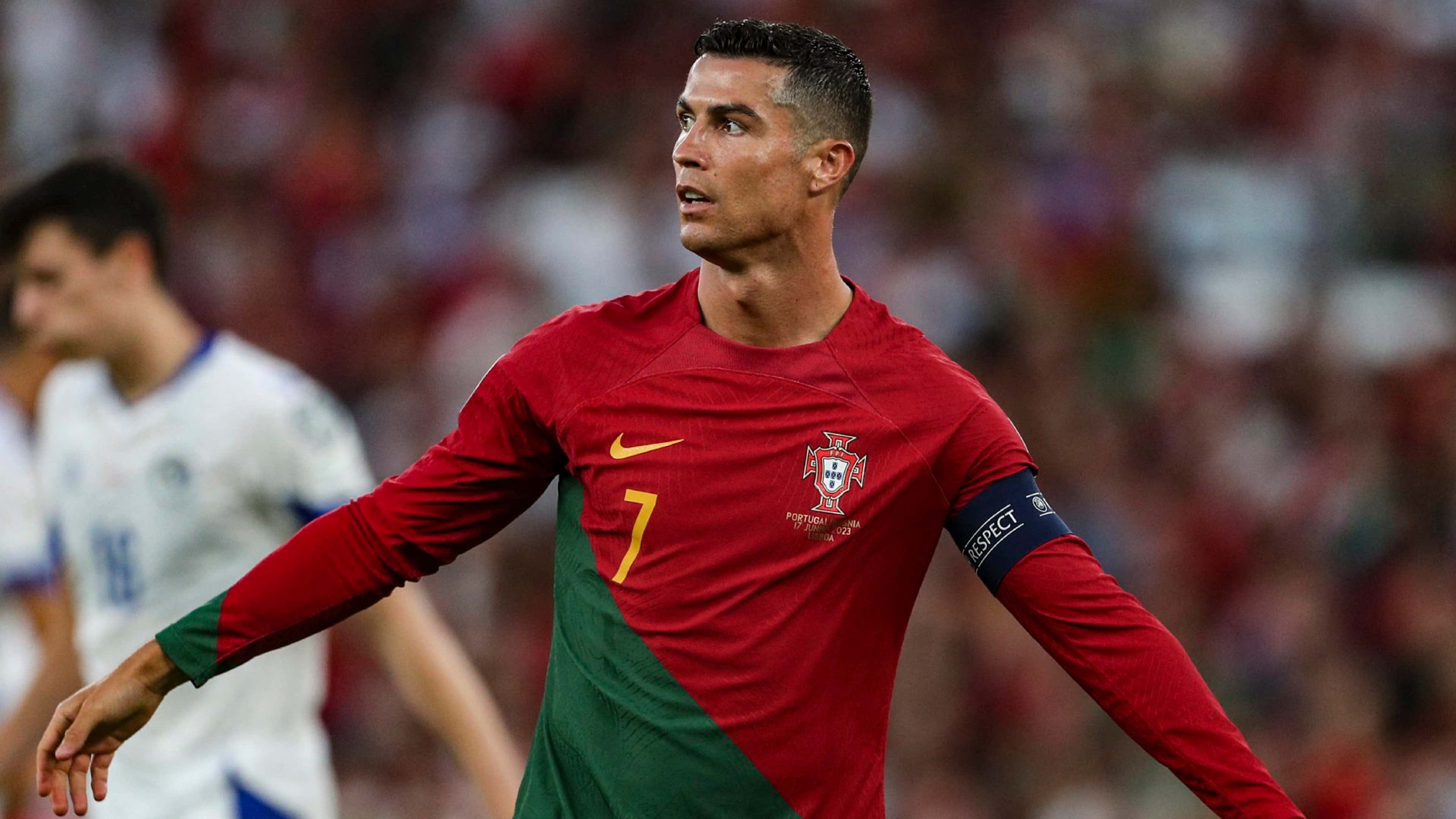 Cristiano Ronaldo LIFTED into the air by pitch invader in Portugal win ...