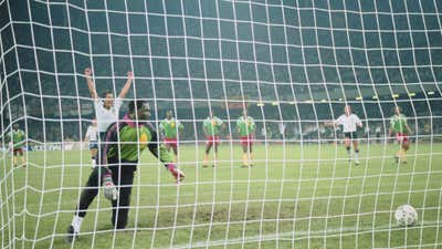 Gary Lineker of England scores the second penalty against goalkeeper Thomas Nkono of the Cameroon during the 1990 FIFA World Cup Quarter Final