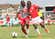 Ulinzi Stars striker John Makwatta tackles a Ushuru FC opponent