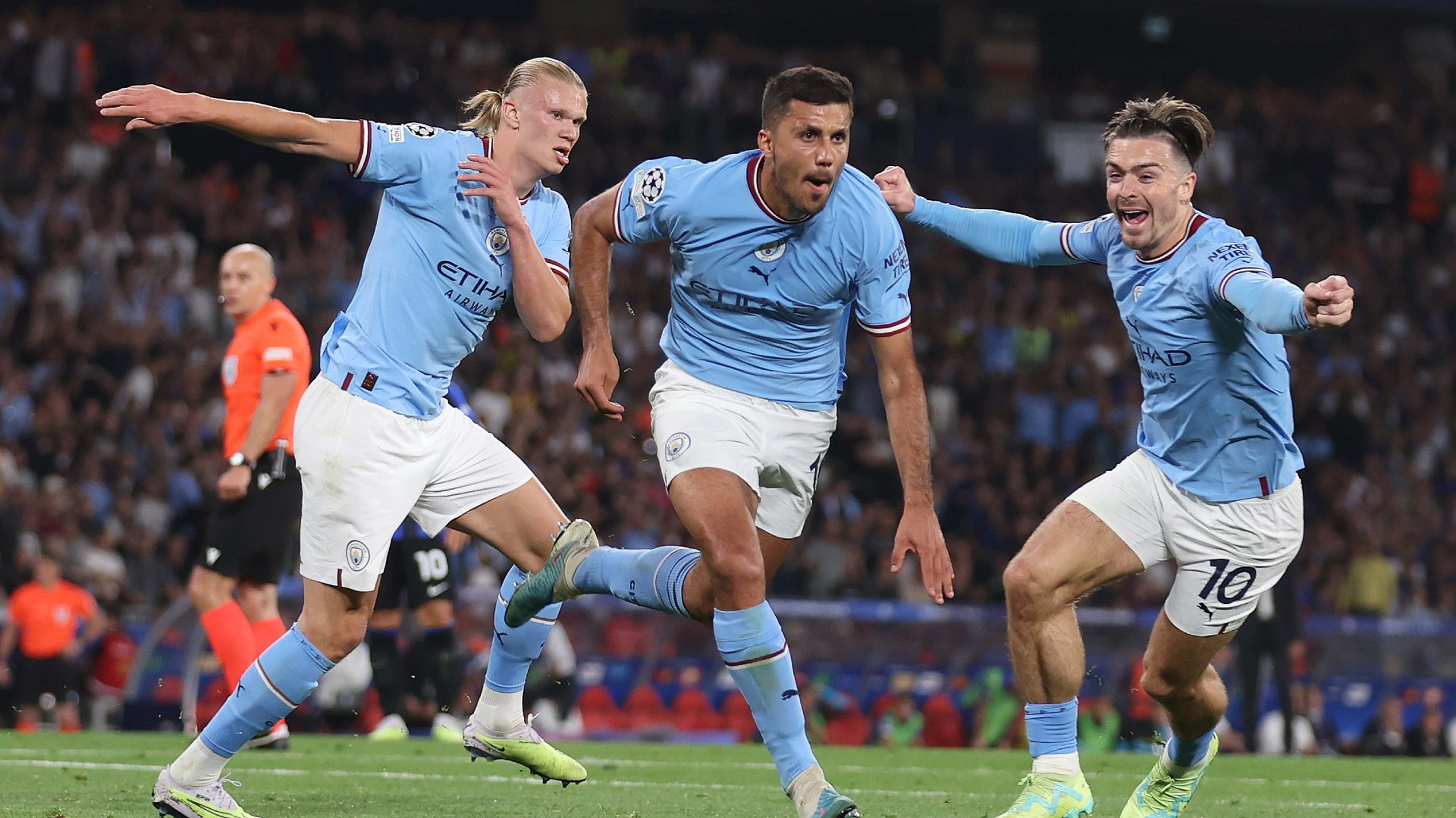  Rodri, a Manchester City midfielder, celebrates a goal with his teammates during a soccer match.