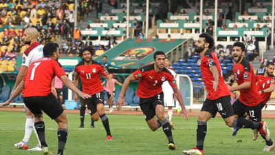 Egypt captain Mohamed Salah (C-R) celebrates scoring the equalizer.