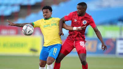 Kermit Erasmus of Mamelodi Sundowns challenged by Teboho Mokoena of Supersport United.