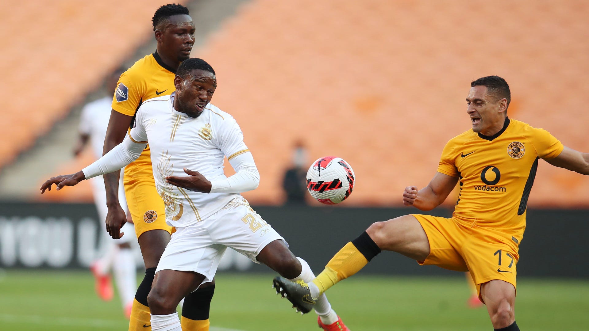 Victor Letsoalo of Royal AM challenged by Cole Alexander of Kaizer Chiefs