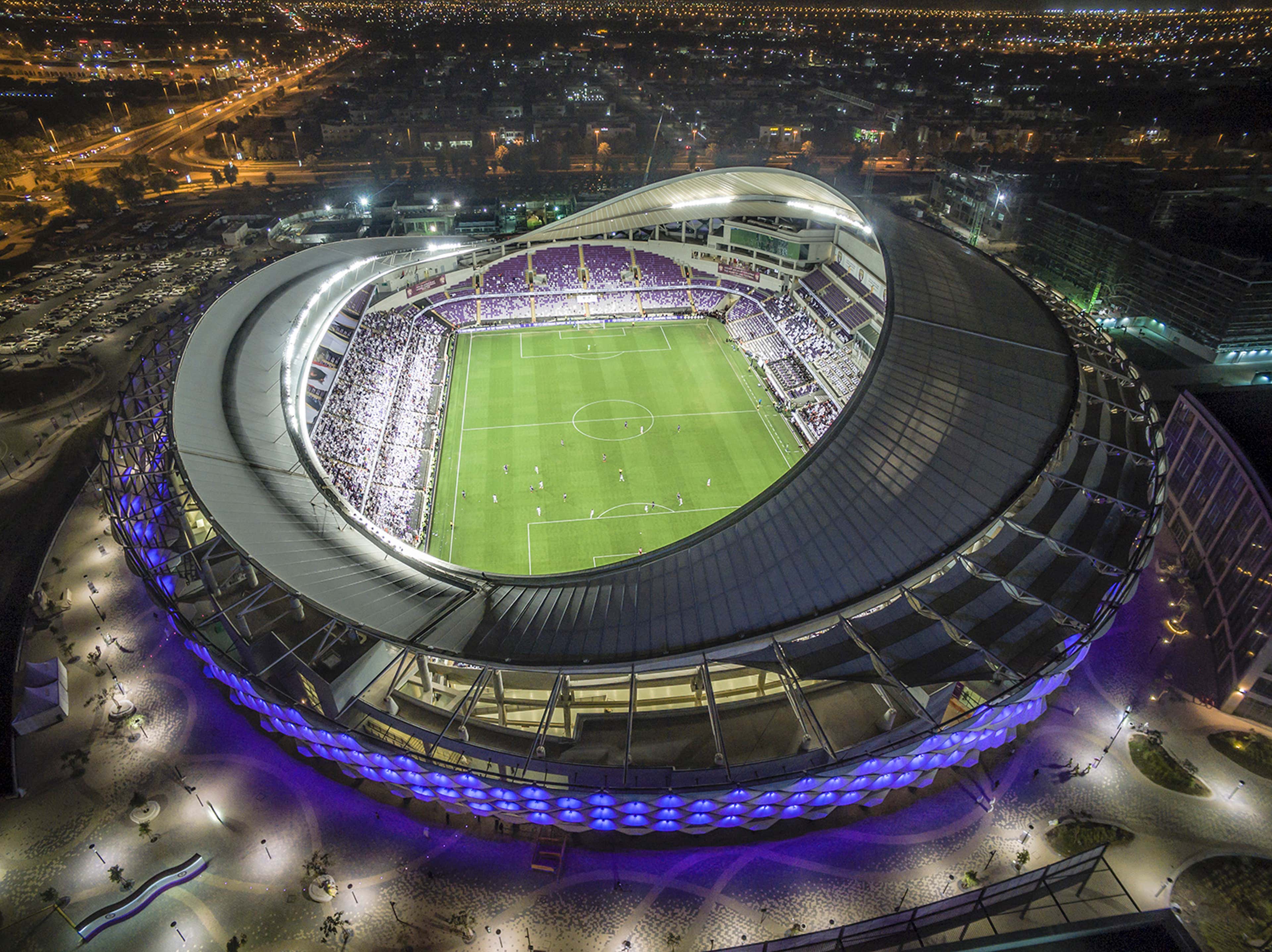 Новые футбольные стадионы. Стадион хазза Бин Зайед. Стадион в Абу Даби. Футбольный стадион в Абу Даби. Стадион Мохаммед Бин Зайед.