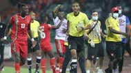 Frederic Mendy of Guinea-Bissau reacts in disappointment after referee Pacifique Ndabihawenimana.
