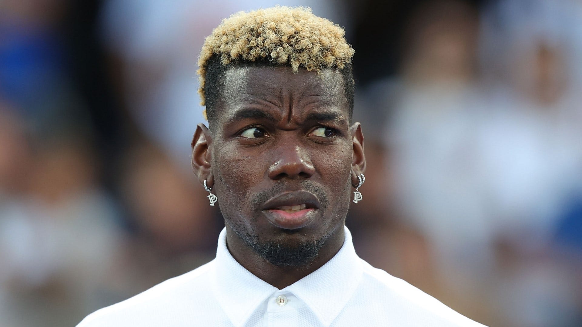 Manchester United fans baffled by Paul Pogba's cryptic 'broken heart'  haircut and message | The Sun