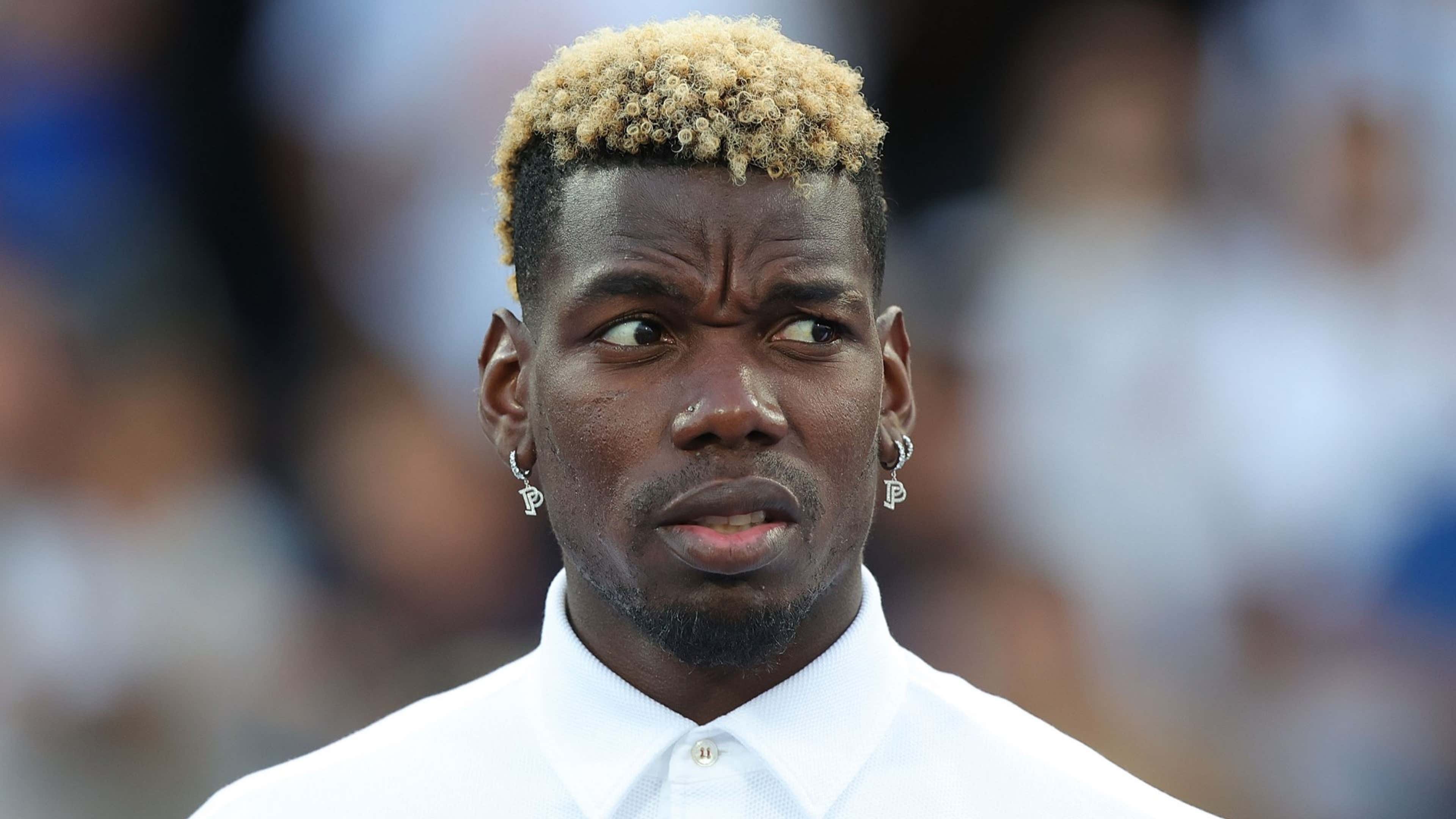 Paul Pogba with a concerned look.