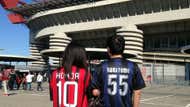 Two Japanese fans in front of San Siro before Ac Milan-Inter