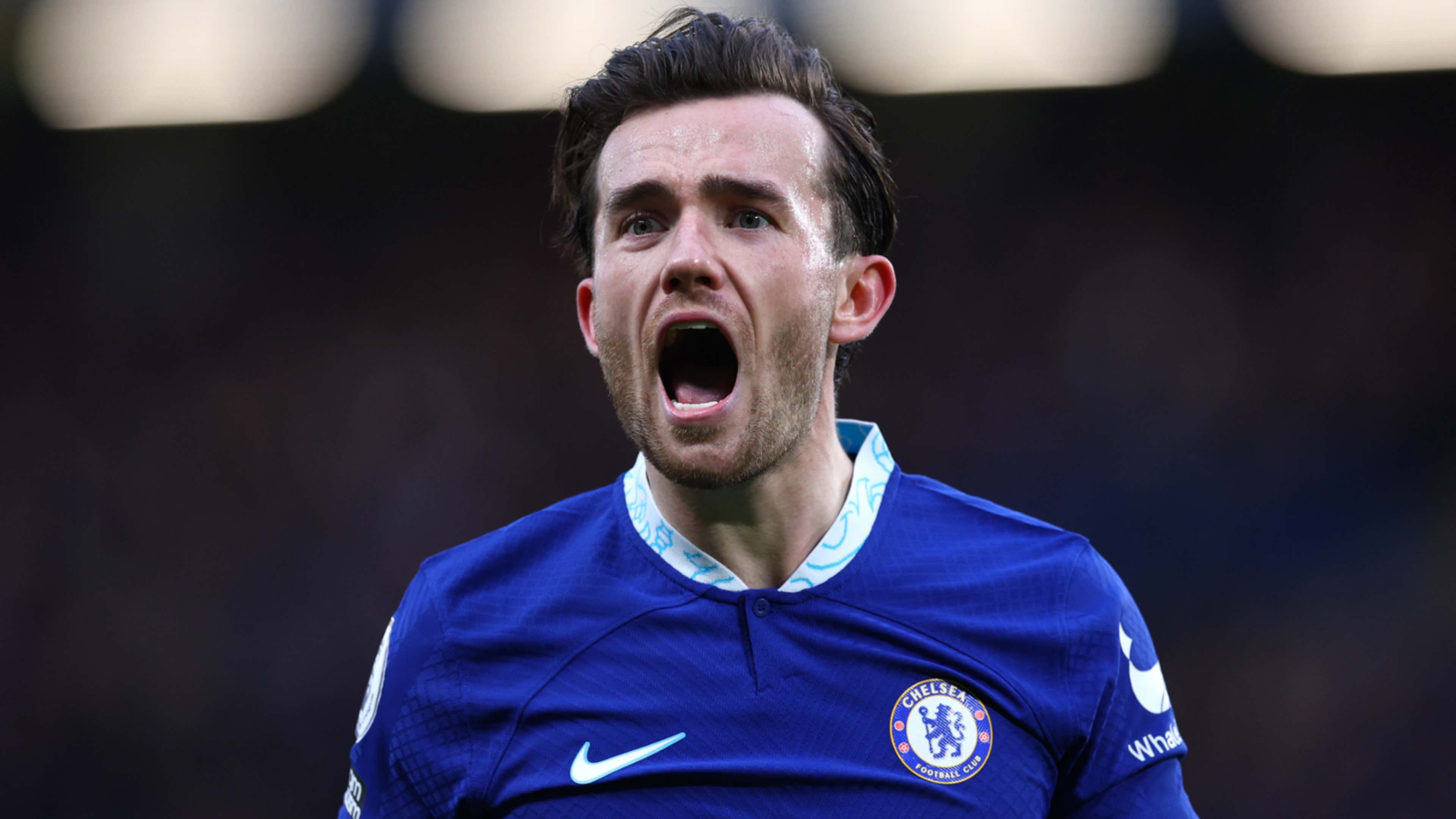  Ben Chilwell, a professional football player, is seen celebrating a goal while wearing a blue Chelsea jersey.