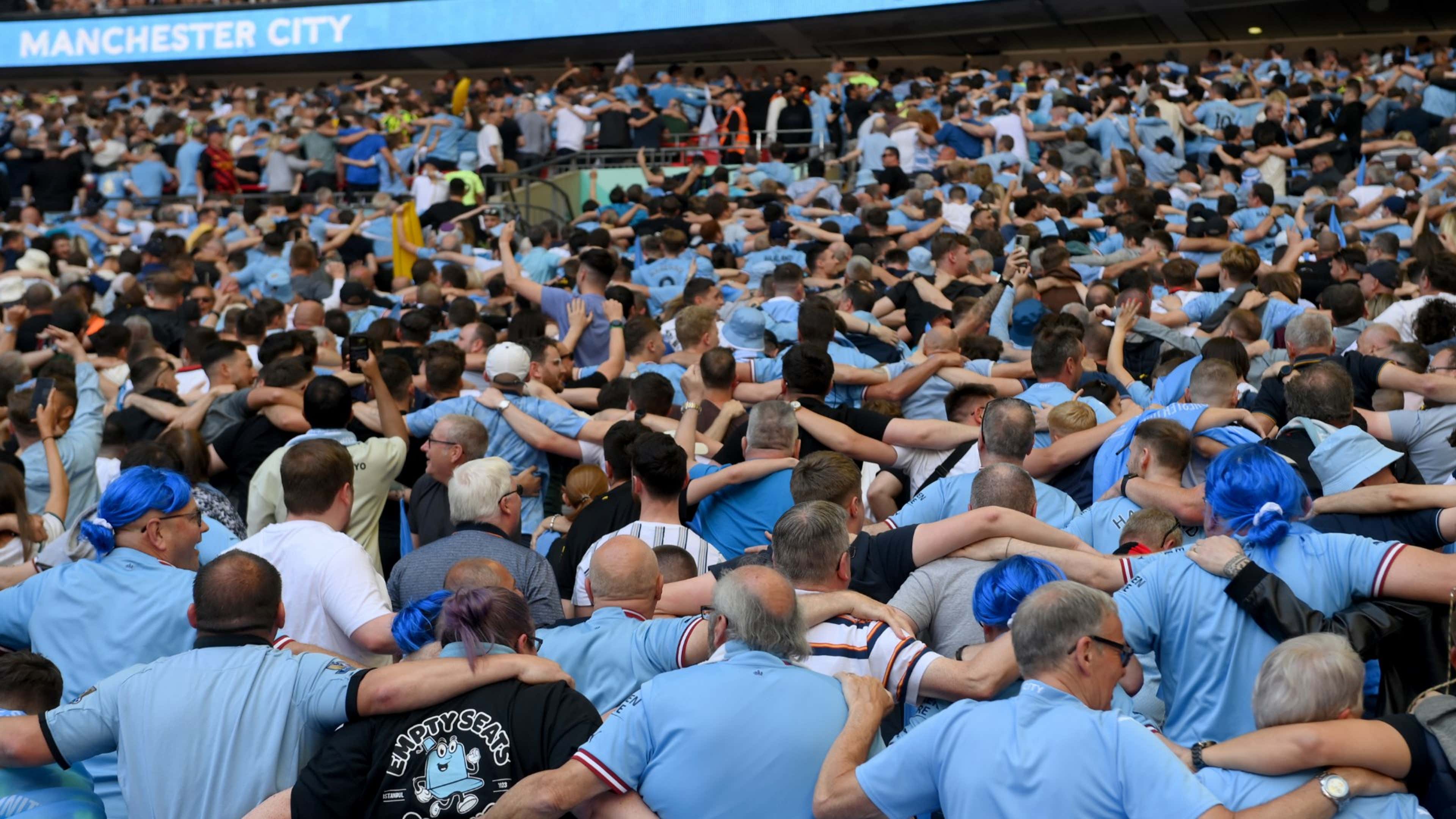 Manchester City fans doing The Poznan
