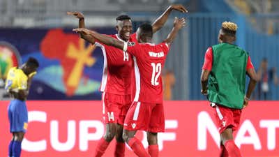 Michael Olunga celebrates goal with Victor Wanyama.