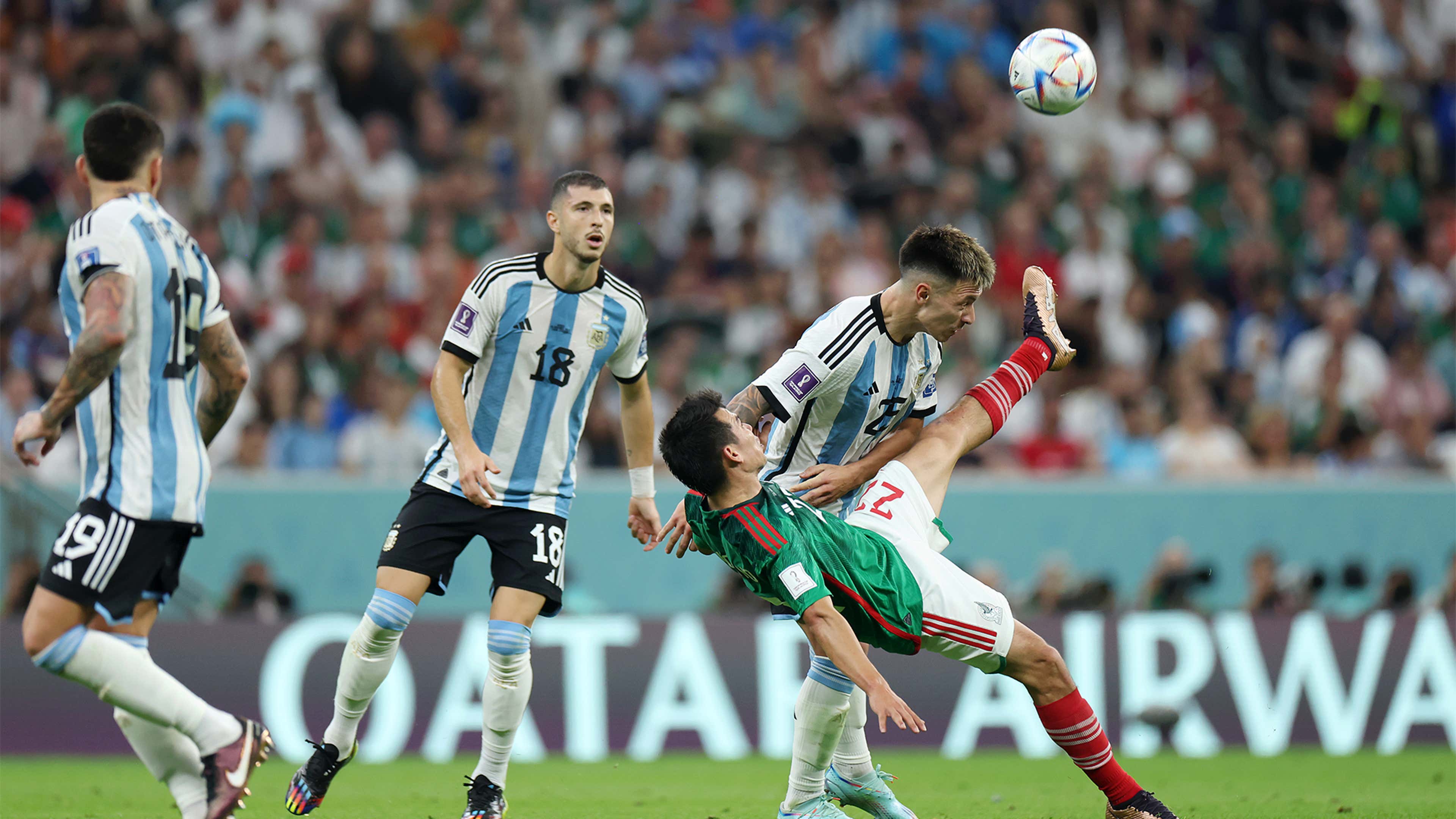 Argentina defender Lisandro Martinez kicked in the face by Mexico's ...