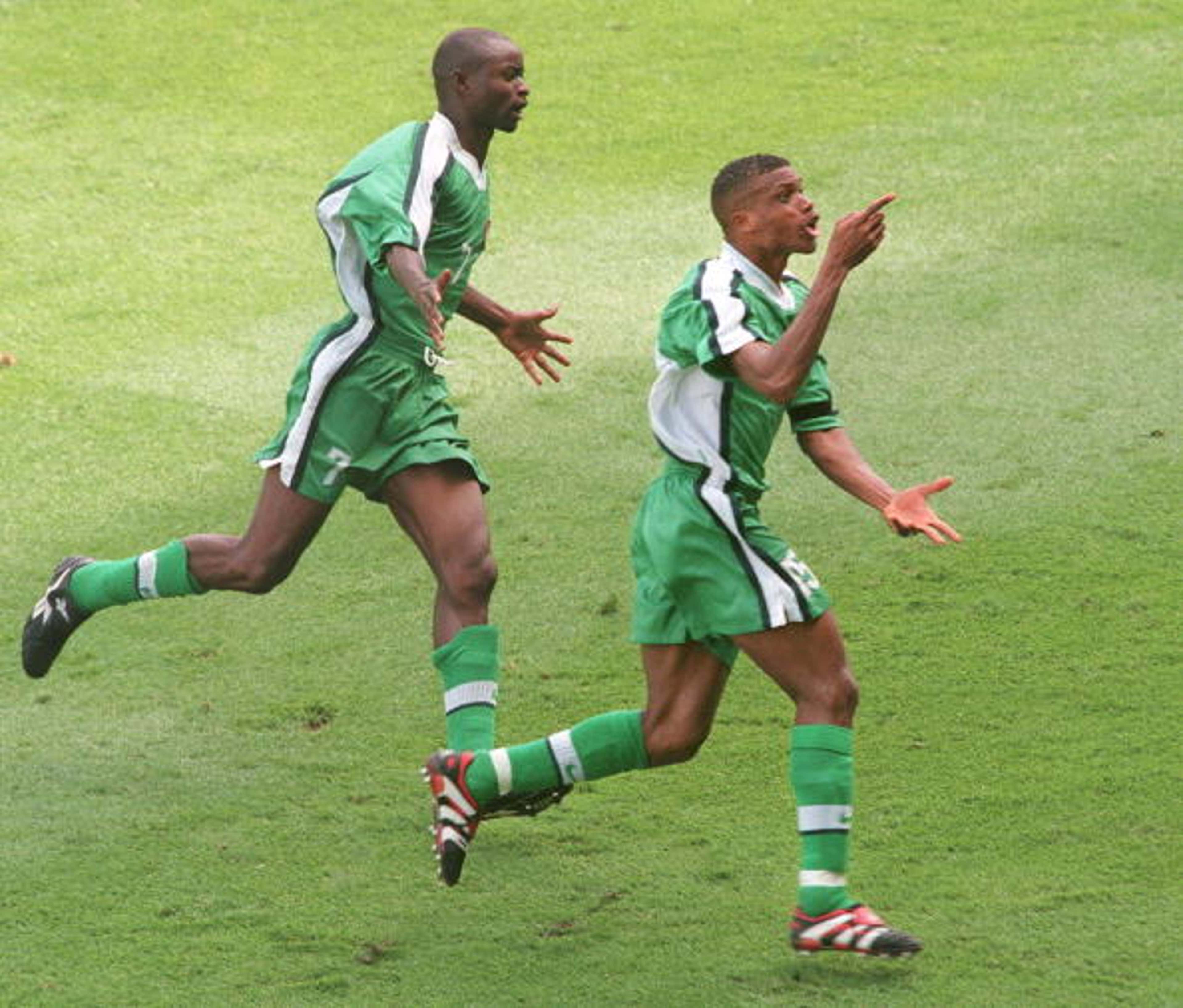 Sunday Oliseh celebrates Nigeria goal against Spain