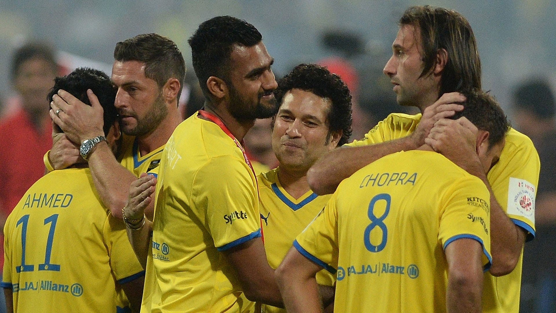 Sachin Tendulkar interacts with Kerala Blasters players after they lost ISL final match against Atletico de Kolkata