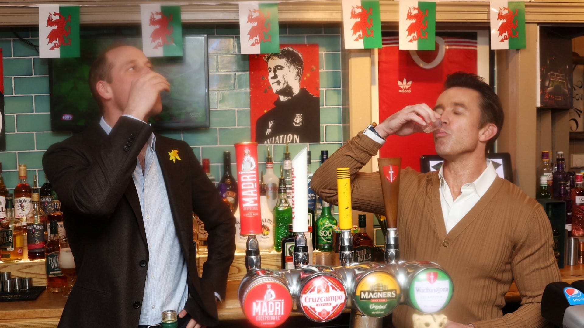 VIDEO: Shots with the future King of England! Wrexham co-owner Rob McElhenney downs whiskey with Prince William as pair pour pints at famous The Turf Pub