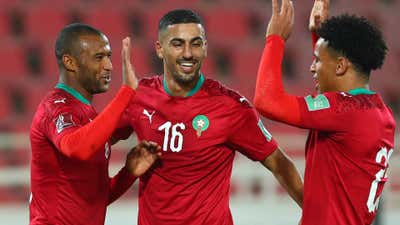 Ayoub El Kaabi of Morocco celebrates goal with teammates Aymen Barkok.