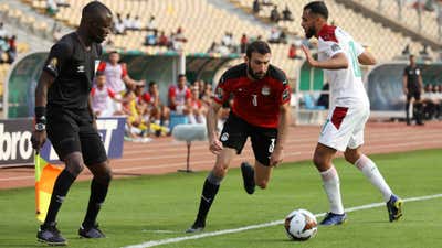 Omar Abdelwahed of Egypt challenged by Sofiane Boufal of Morocco.