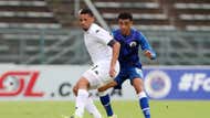 Cheslyn Jampies of Sekhukhune United challenged by Keenan Phillips of Supersport United, December 2021